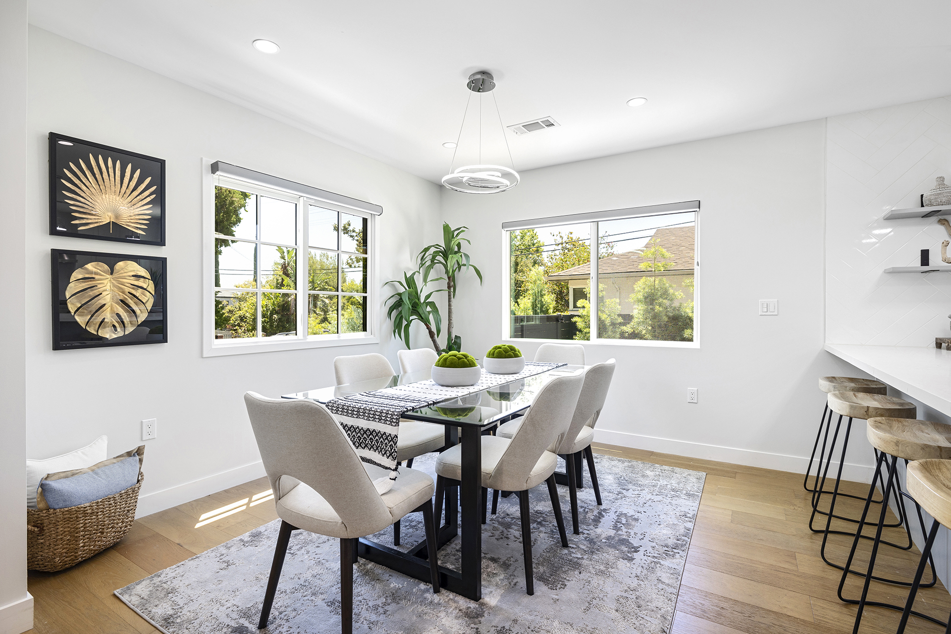 Staged dining room with art wall - home staging, Greater Los Angeles