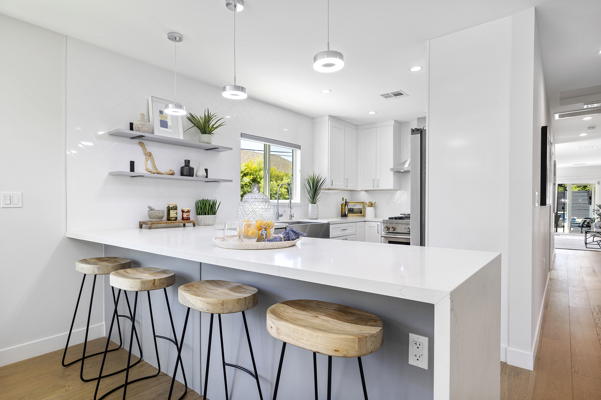 Staged kitchen with white bar counter - home staging
