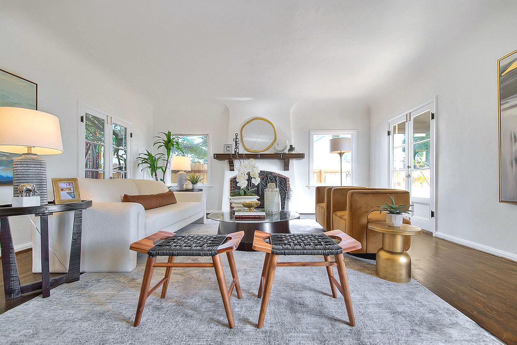 Vacant home staging — living room with mantel and curated decor