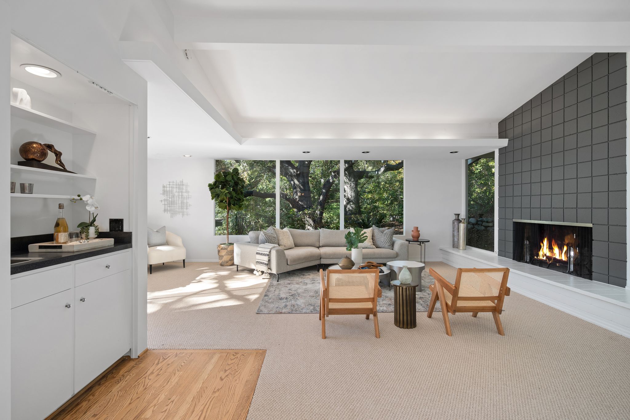 Wide-angle staged midcentury living room - vacant property home staging