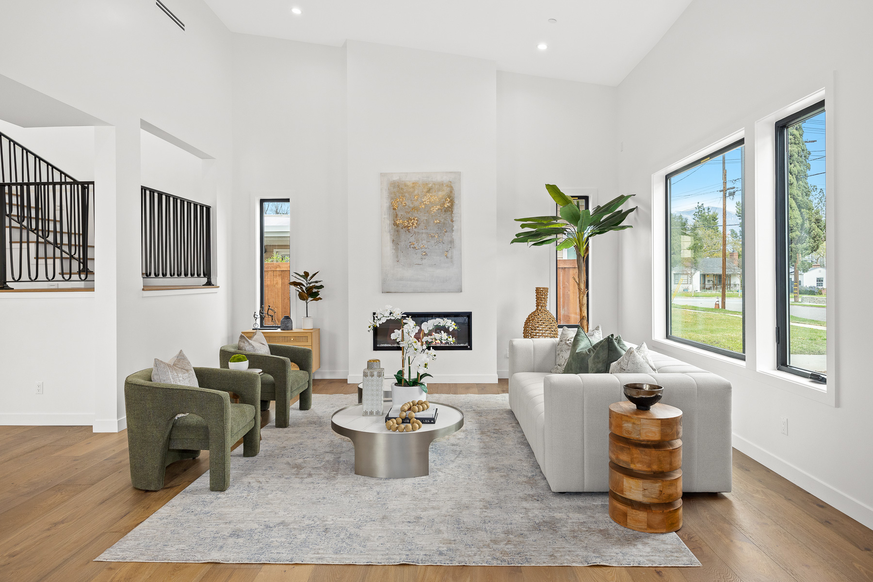 Staged living room with accent chairs - home staging for new construction