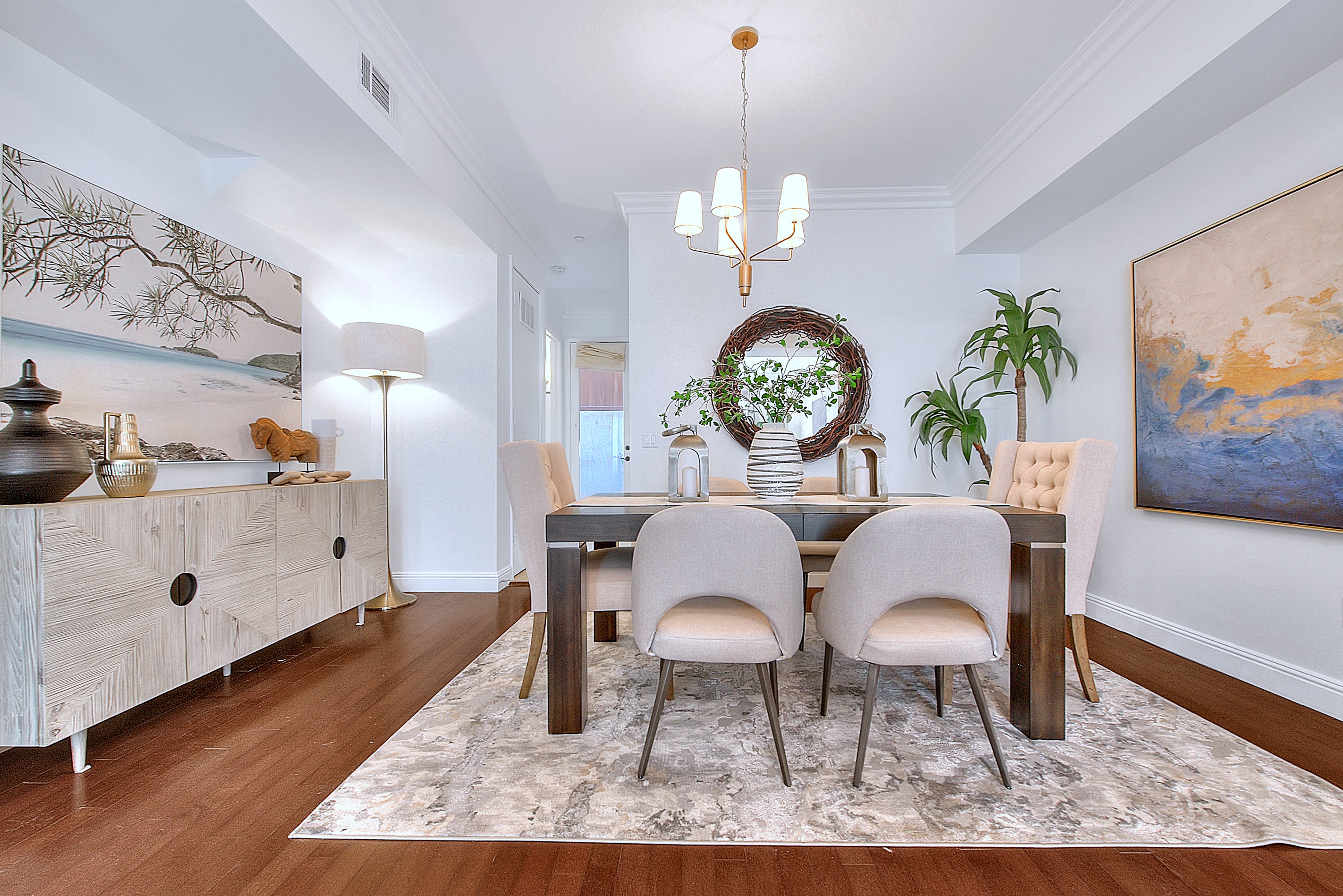 Staged dining room with statement chandelier - home staging