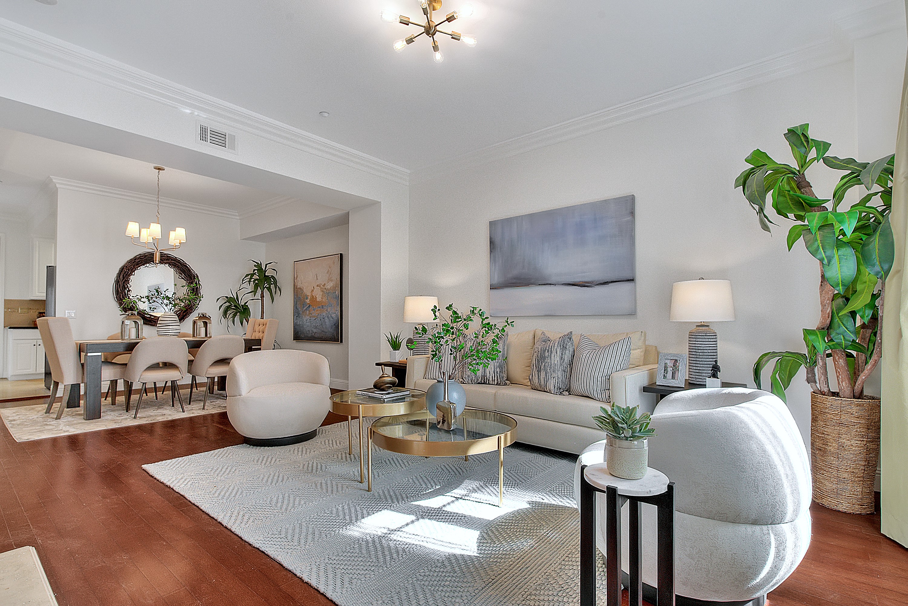 Staged living room with sputnik chandelier - home staging
